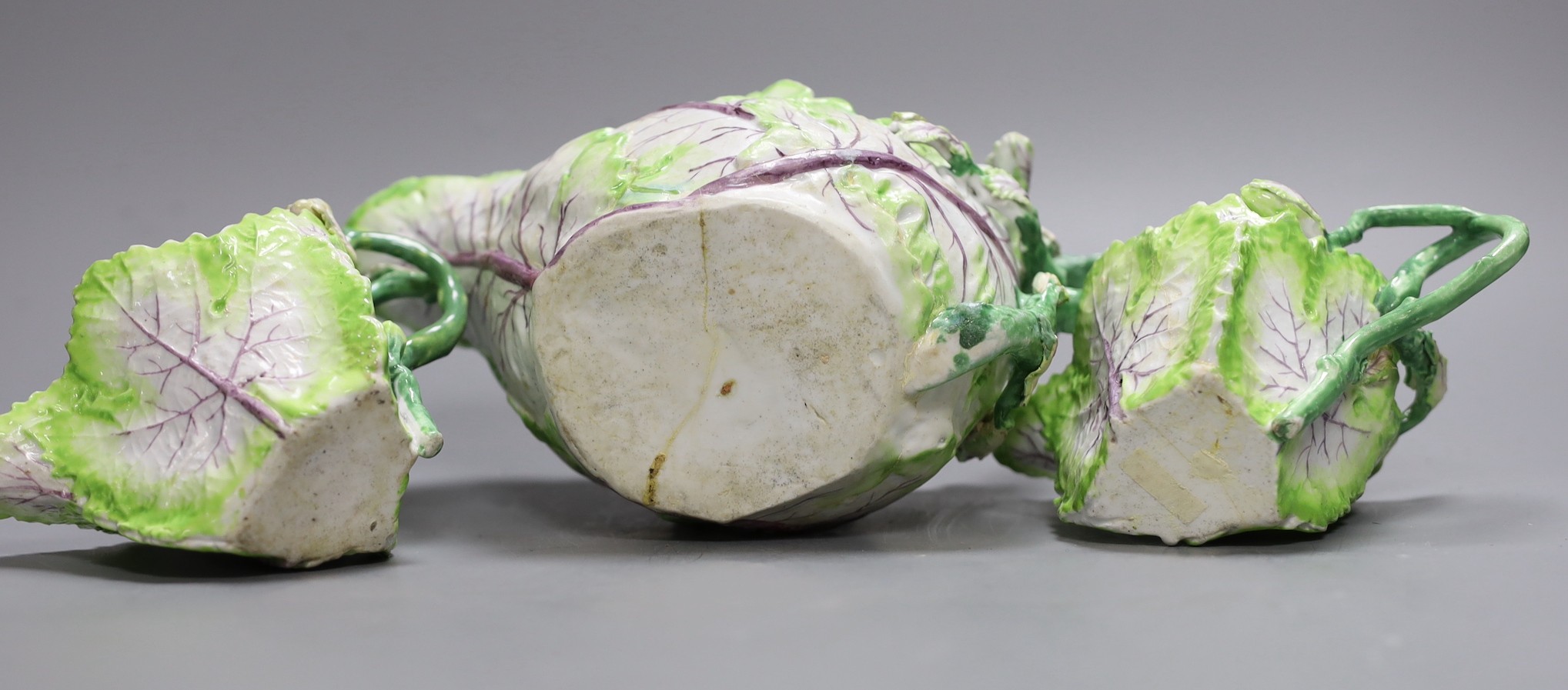 A Longton Hall cabbage leaf sauceboat and two similar creamboats, c.1755, faults and Newhall type tea wares, largest jug 22 cms wide